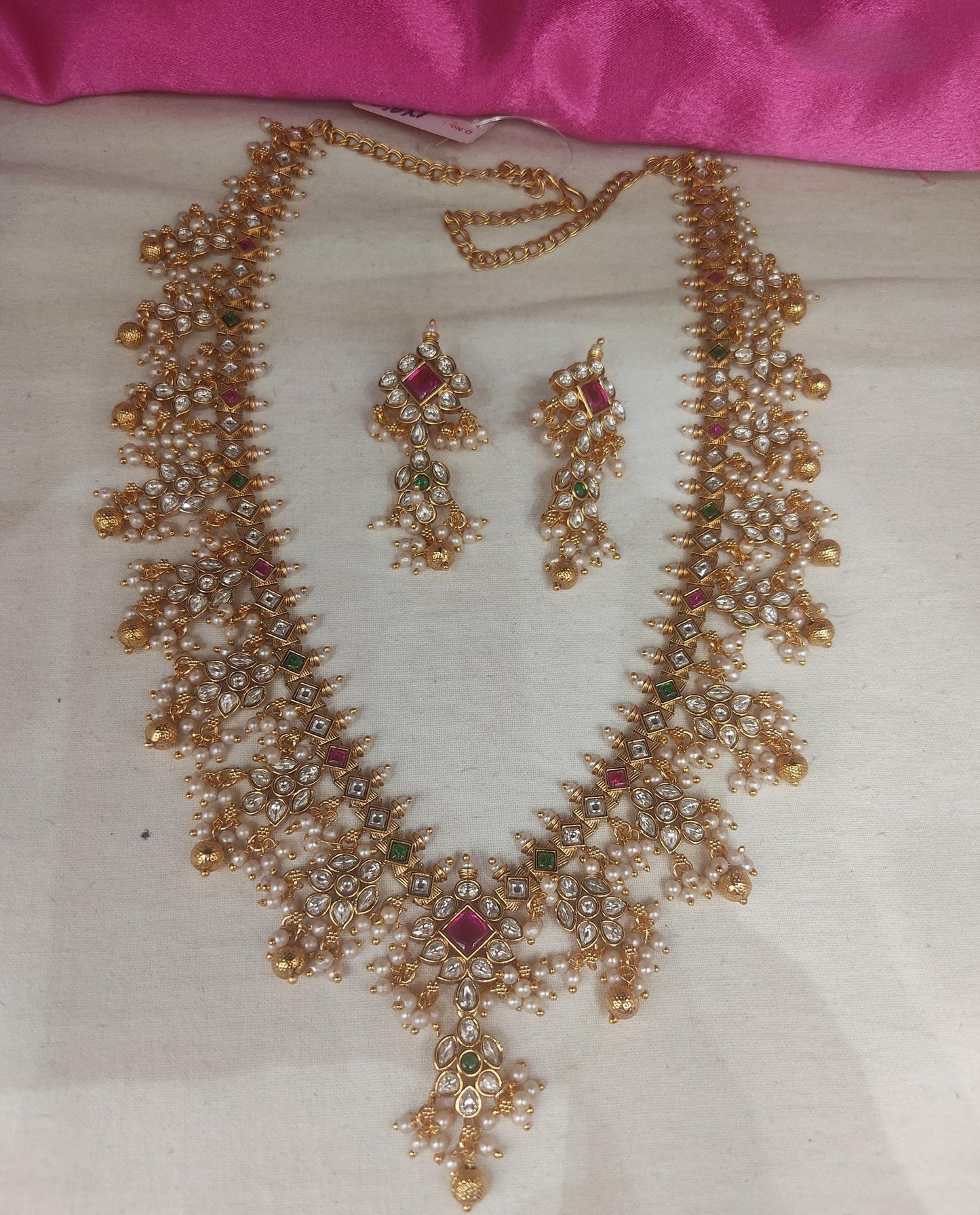 Guttapusalu long set with kundan stones