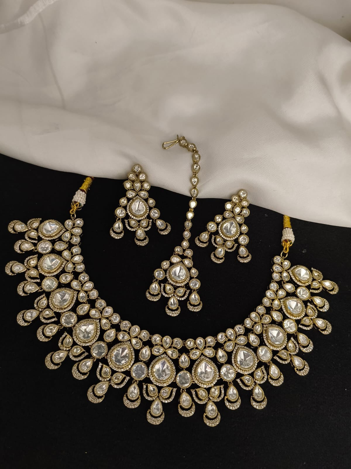 Kundan necklace set with earrings and tika