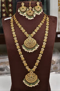 Chandbali design bridal set with earrings and tika
