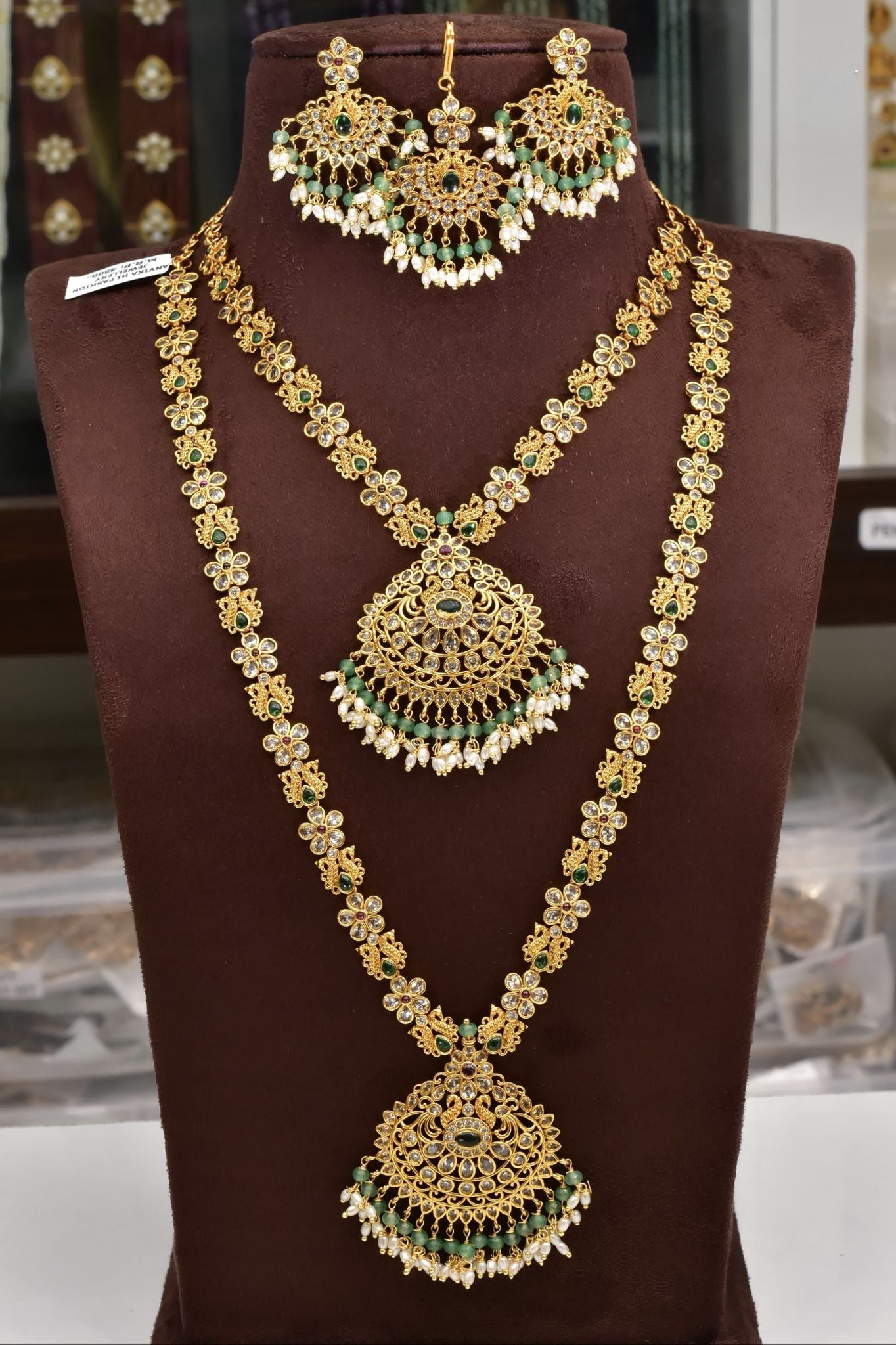 Chandbali design bridal set with earrings and tika