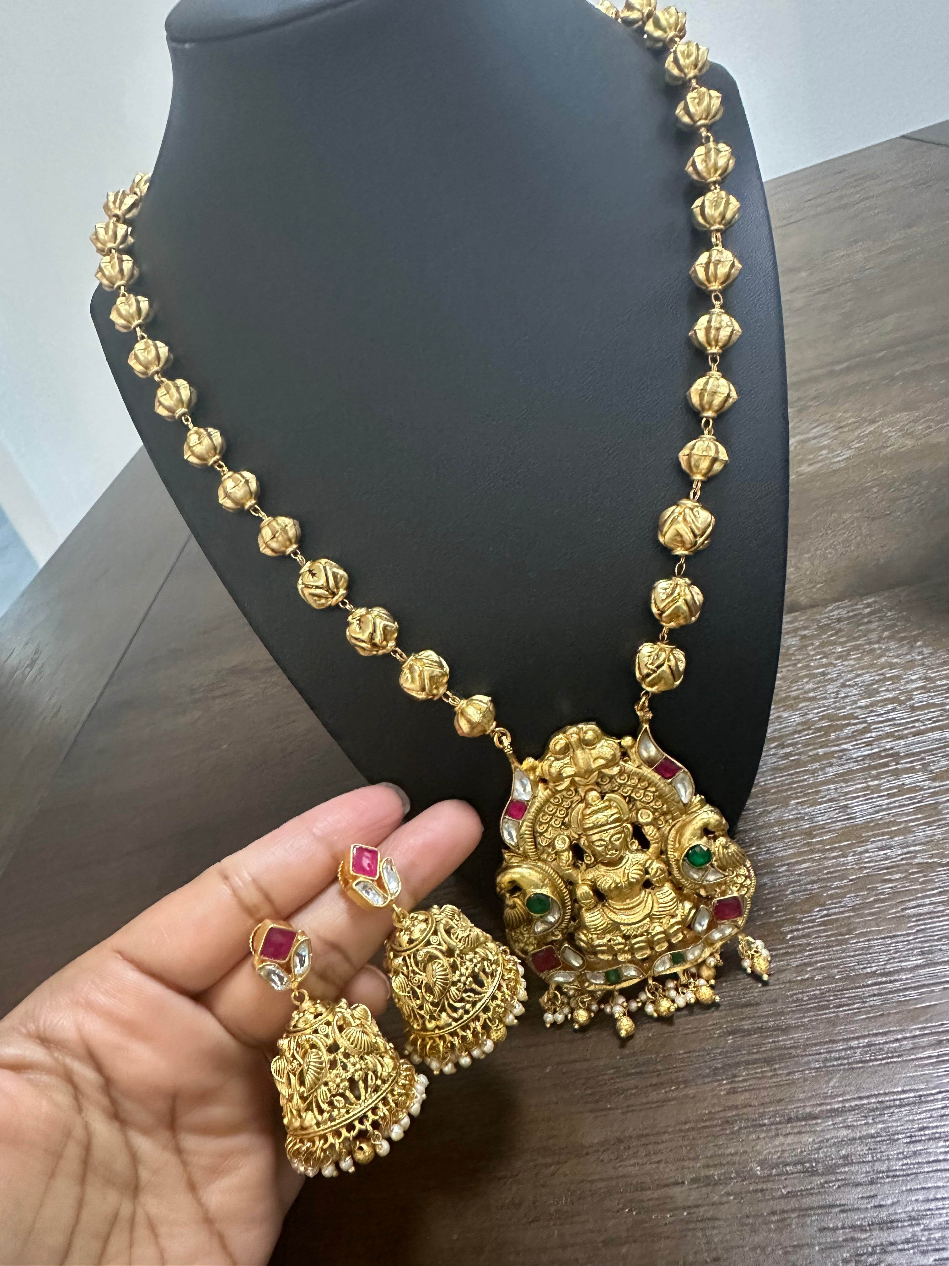 Gold beads matar mala with lakshmi pendant and jhumkas