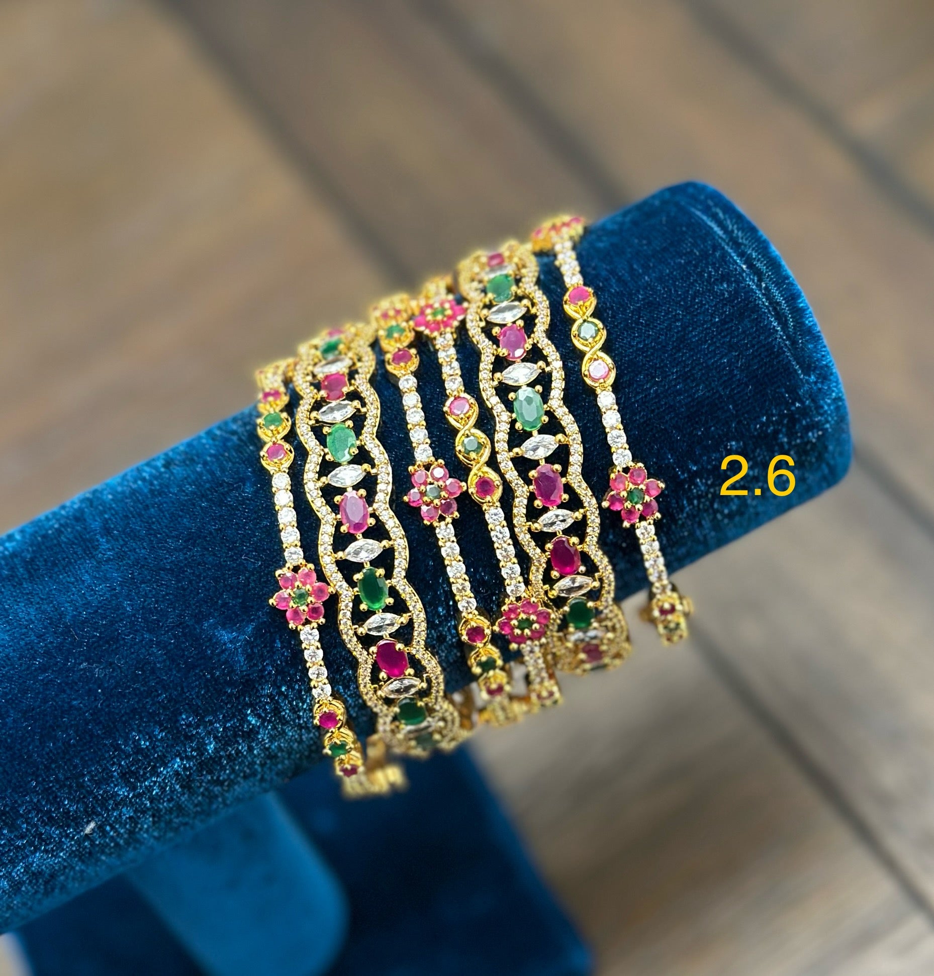 set of 6 multi color bangles in gold finish