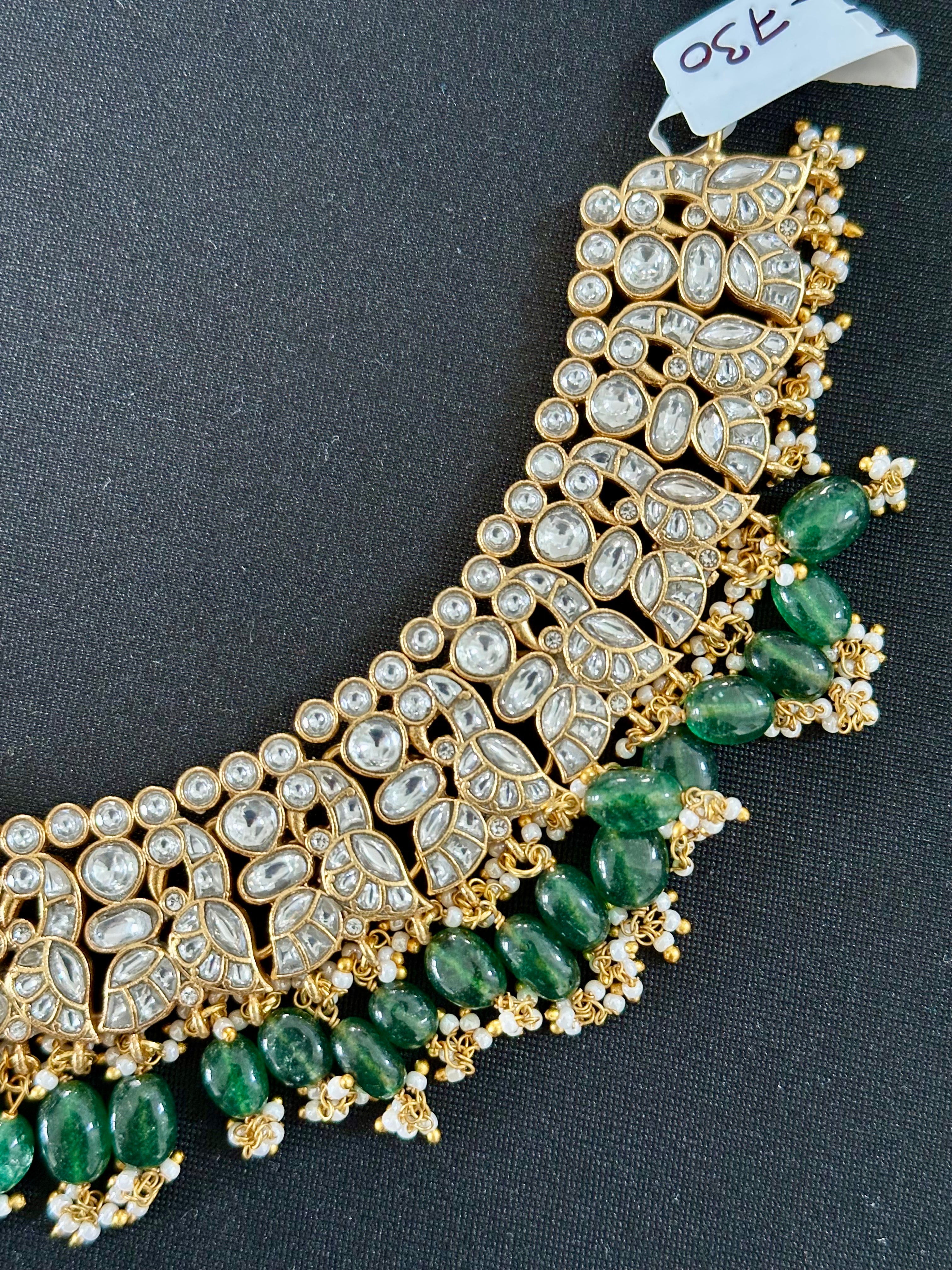 White Jadau Kundan Necklace Set With Green Beads