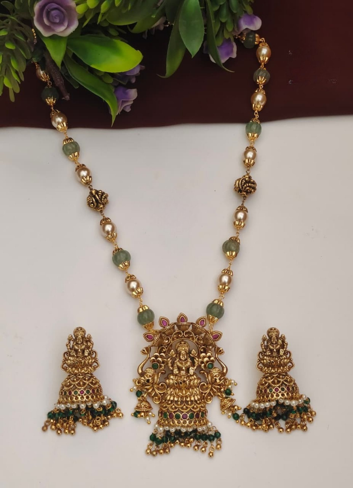 Pearls And Pumpkin Beads Lakshmi Pendant Mala Set With Jhumkas
