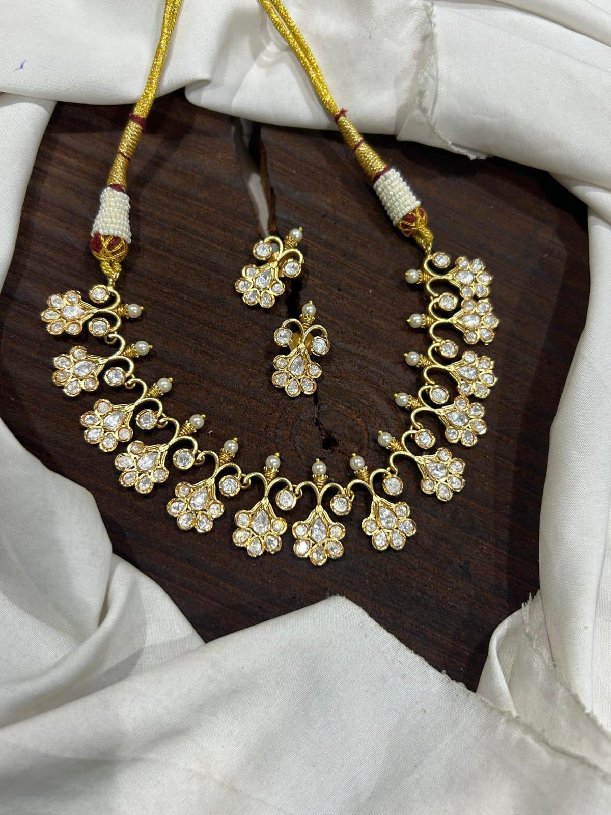 JadauKundan White Kundan Set with Pretty Studs